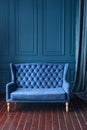 Antique wood sofa couch in vintage room. Classical style armchair. Royalty Free Stock Photo