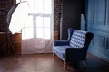 Antique wood sofa couch in vintage room. Classical style armchair in photo studio with lightning equipment. Royalty Free Stock Photo