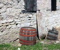 Antique wooden barrels with and wooden trough Royalty Free Stock Photo