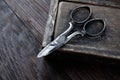 Antique wooden box and old vintage retro scissors Royalty Free Stock Photo