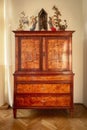 Antique wooden bureau in Biedermeier style interior design