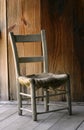 Antique wooden cow hide chair Royalty Free Stock Photo
