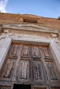 Antique wooden door, entrance to the building, temple, architecture, Italy Royalty Free Stock Photo