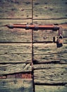 Antique wooden door with lock and padlock Royalty Free Stock Photo