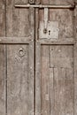 Antique wooden door with old classic iron lock. Vintage Royalty Free Stock Photo