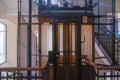 Antique wooden Elevator in a Metal Shaft Royalty Free Stock Photo