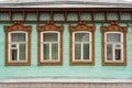 Antique wooden house in Old Town city. wooden house with beautiful carved platbands Royalty Free Stock Photo
