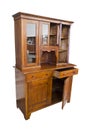 Antique wooden italian furniture just restored with opened dresser and showcase on white background