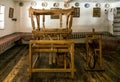 Antique wooden loom in the village weaver`s house. Housing and workshop Royalty Free Stock Photo