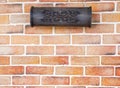 Antique wooden mailbox on brick wall Royalty Free Stock Photo