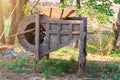 Antique wooden rice-scattering equipment for home use. Asian local wisdom.