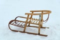 Antique wooden sleds with metal inserts and bindings