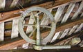 Antique wooden spindle hung up under the roof Royalty Free Stock Photo