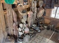 Antique wooden statues and tableware at tongkonan traditional home