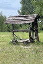 Antique wooden water well stock photo