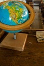An Antique World Globe on a Desk Royalty Free Stock Photo