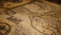 Antique world map on stained paper, selective focus, exploration journey generated by AI