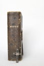 Antique Worn Leather Bible with Antique Metal and Wood Cross on Royalty Free Stock Photo