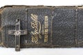 Antique Worn Leather Bible with Antique Wood and Metal Cross on