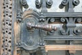 Antique wrought iron door and handle Royalty Free Stock Photo