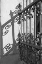 Antique wrought iron fence casting a beautiful shadow