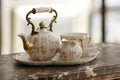Antiques china tea set on marble Royalty Free Stock Photo