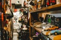 antiques in the vintage shop: art, toy cars, lantern lamps, sculpture, miniatures, old cameras, televisions, typewriter, etc. Kota