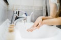Antiseptic hand washing procedure with soap and water in bathroom.Decontamination steps of hand hygiene routine.Cleaning hands, Royalty Free Stock Photo