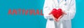 Antiviral theme with a doctor holding a heart