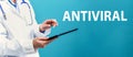 Antiviral theme with a doctor using a tablet