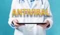 Antiviral theme with a doctor using a tablet pc