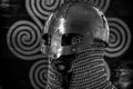 antivirus or firewall concept, Viking warrior helmet with chainmail over silver shield