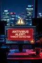 Antivirus Threat Detected Warning On Computer Screen In Modern Night Office Environment Royalty Free Stock Photo