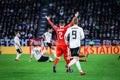 Antonio Rukavina raises his arms during a soccer game