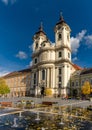 The Antony of Padua Church in Eger and fountain with autumn color trees and leaves Royalty Free Stock Photo