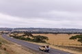 Landcruiser Moving along Ntulele Highway in Narok CountyWheat Farm Plantations