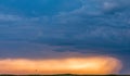 Magical sunset dramatic clouds sun rays light burst on the savannah grasslands at the Maasai Mara National Game Reserve Park And C Royalty Free Stock Photo