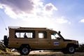Landcruiser Toyota vehicle van parked in the Savannah grasslands of the Maasai Mara National Game Reserve park Rift Valley
