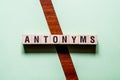 Antonyms word concept on cubes Royalty Free Stock Photo