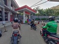 Bekasi, West Java Indonesia August 09 2019: Antrian Sepeda motor at SPBU or Queue of motorbike at gas station