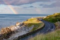 Antrim Coastal Road and rainbow in Northern Ireland, UK Royalty Free Stock Photo