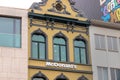 Mc donalds sign on an building in antwerp belgium