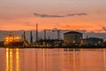 Antwerp Belgium August 2019, harbor of Antwerpen with container vessel and oil raffin and tanks