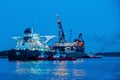 Antwerp Belgium August 2019, harbor of Antwerpen with container vessel and oil raffin and tanks