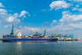 Antwerp Belgium August 2019, harbor of Antwerpen with container vessel and oil raffin and tanks