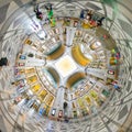 Distorted panorama of main train station. Funny fisheye point of view Royalty Free Stock Photo