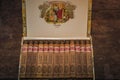 Box of Romeo and Julieta Cuban cigars on wooden rustic background Royalty Free Stock Photo