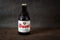 ANTWERP, BELGIUM - JULY 14, 2020: A bottle of DUVEL alcoholic specialty beer on dark background. Royalty Free Stock Photo