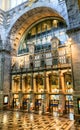 Antwerp, Belgium - June 2019: Interior of Antwerp Central Train station with sun shining through the glass windows