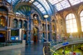 Antwerp, Belgium - June 2019: Interior of Antwerp Central Train station with sun shining through the glass windows